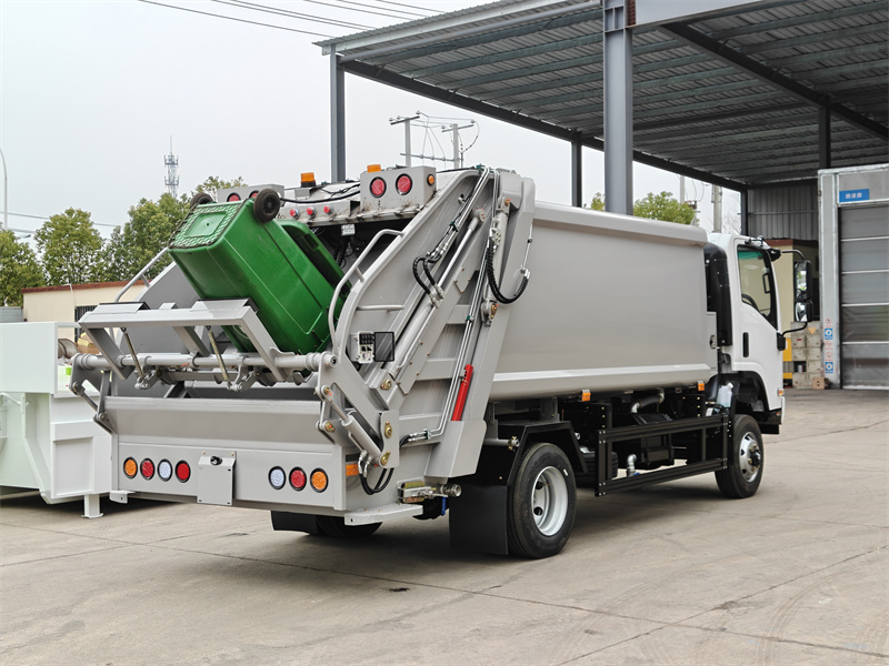 ISUZU NPR off-road garbage compactor truck