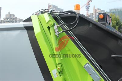 Trash compactor made by Isuzu trucks