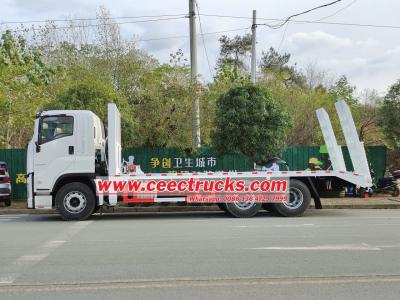 Isuzu giga Excavator Transport Stock Photos